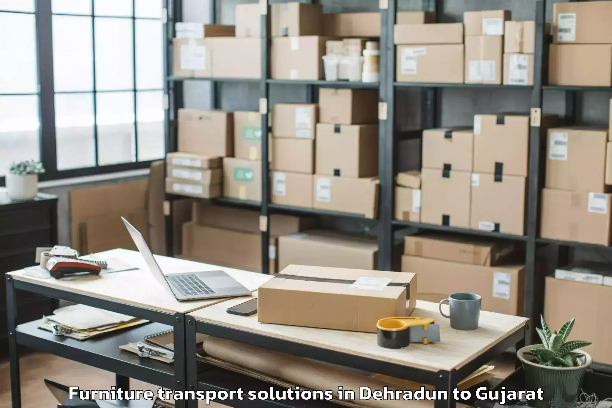 Expert Dehradun to Gussar Furniture Transport Solutions